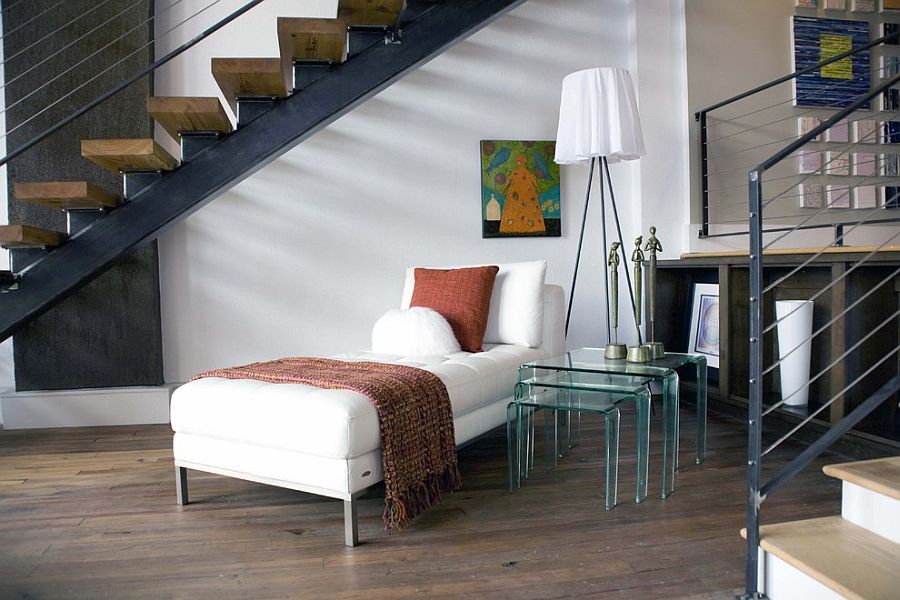 Reading and relaxing nook under the staircase with Rosy Angelis Floor Lamp [Design: Sylvia Martin]