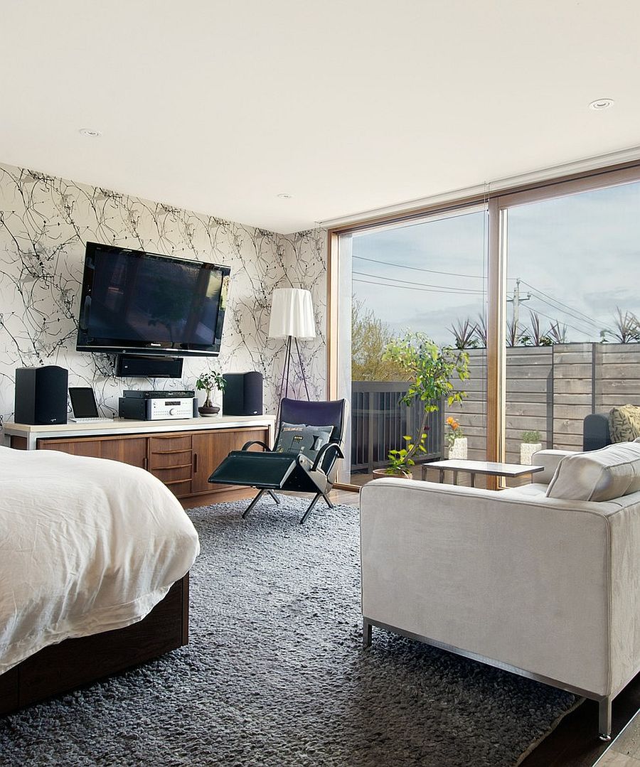 Rosy Angelis floor lamp stands out despite being placed in the corner of the bedroom [Design: Wanda Ely Architect // Photography: Andrew Snow]