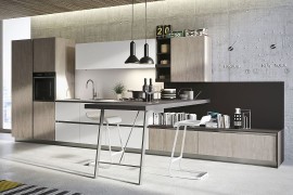 Sleek kitchen workstation and breakfast zone design save on space 270x180 First Kitchen: Modular Freedom Wrapped in Casual Minimalism