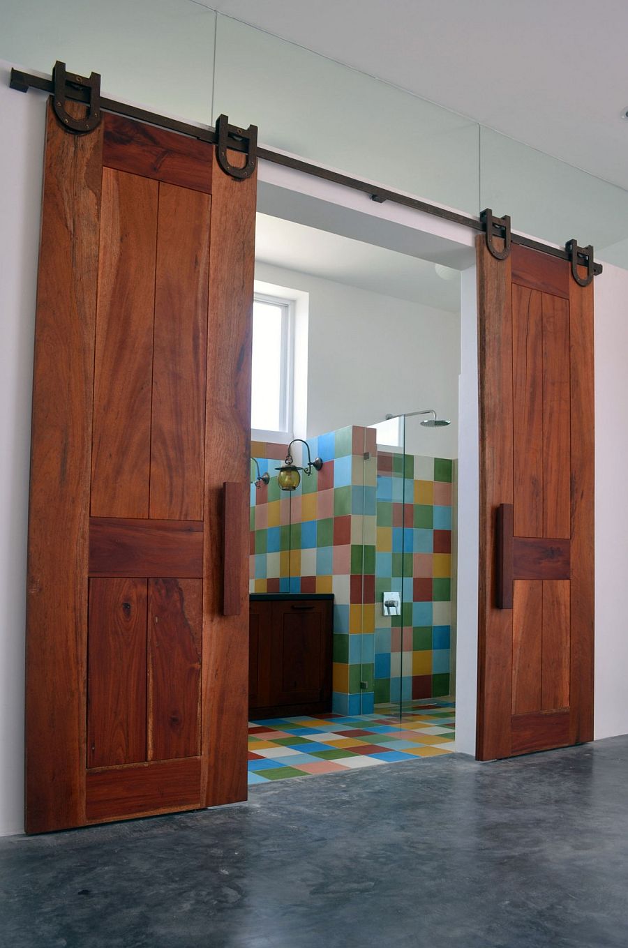 Sliding barn doors for the colorful bathroom