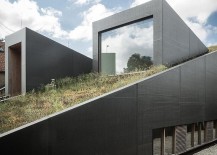Sloped-green-roof-of-House-Pibo-in-Belgium-217x155