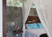 Stone-wall-of-the-tropical-style-bedroom-217x155