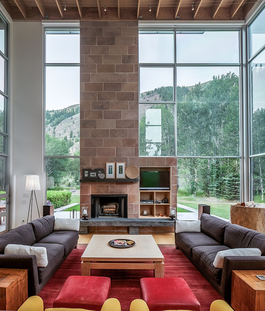 Tall floor lamp is perfect for a living room with high ceiling [Design: Michael Doty Associates Architects]