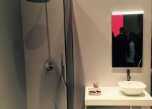 Tiny-corner-shower-area-with-a-glass-partition-217x155