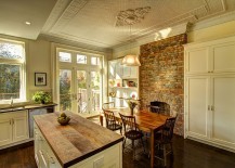 Traditional-kitchen-and-dining-area-with-brick-wall-and-a-fabulous-ceiling-217x155