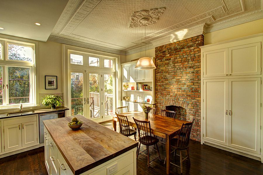 Traditional kitchen and dining area with brick wall and a fabulous ceiling