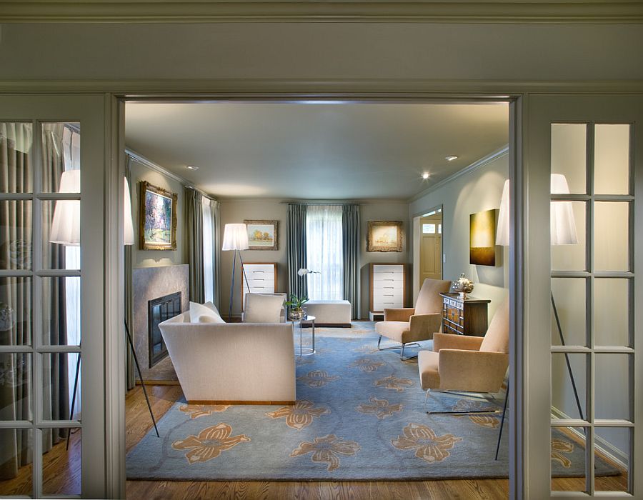 Trifecta of tripod floor lamps in the contemporary living room [Design: Ernesto Santalla / Photography by Morgan Howarth]