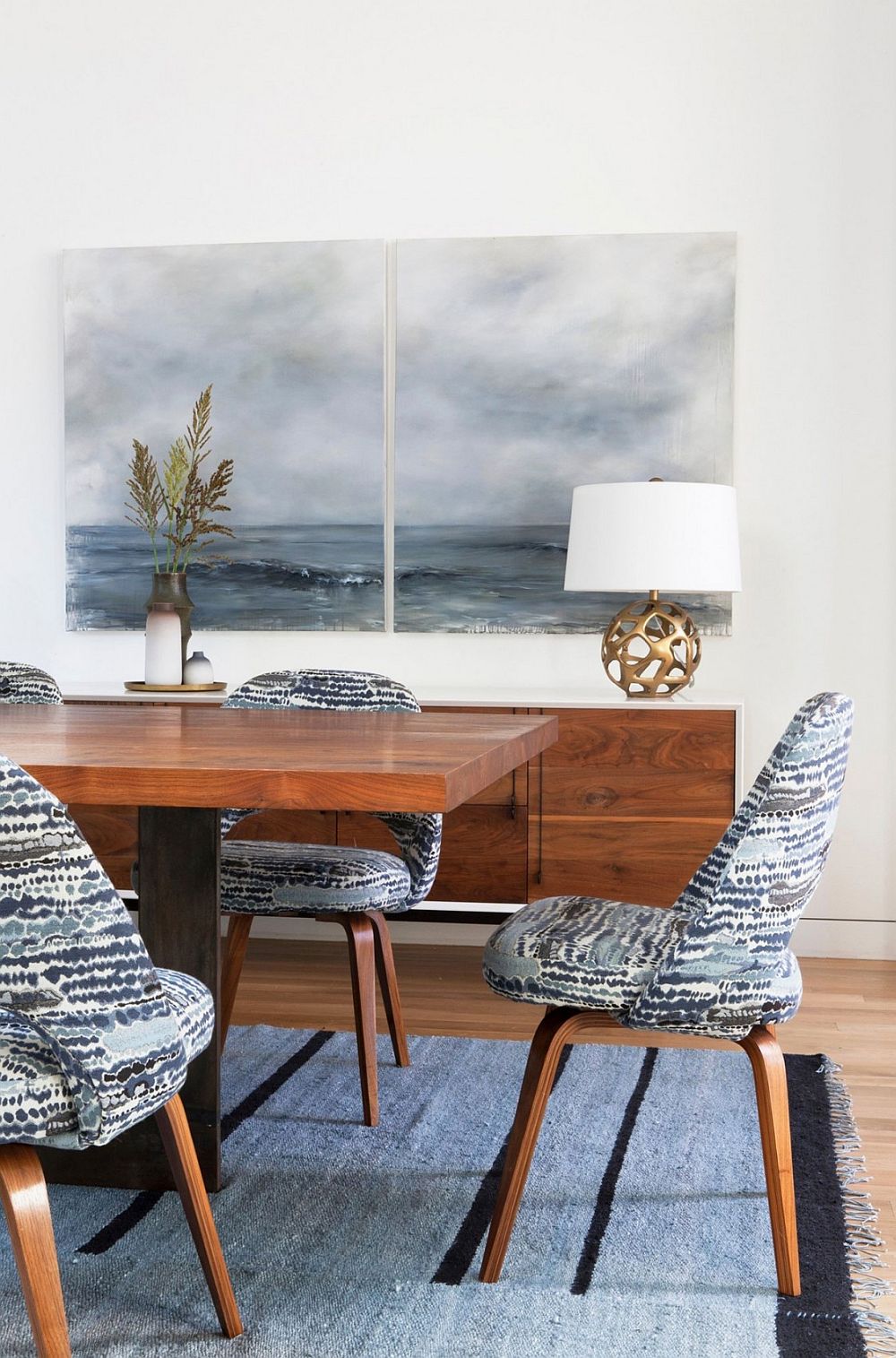 Wall art ushers in an image of tranquility inside the dining room