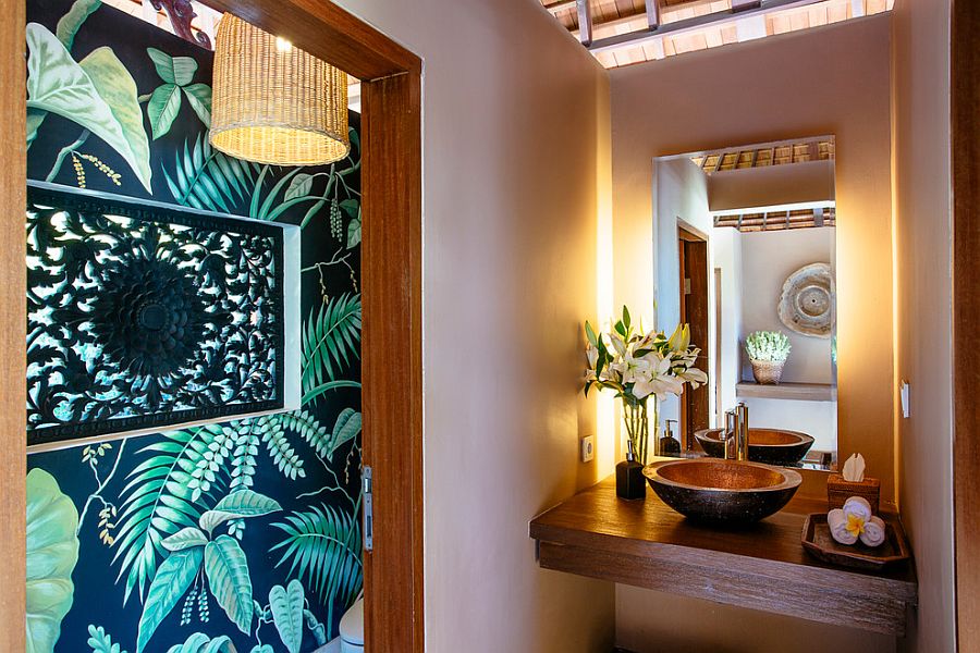 Wallpaper brings topical flavor to the beautiful powder room