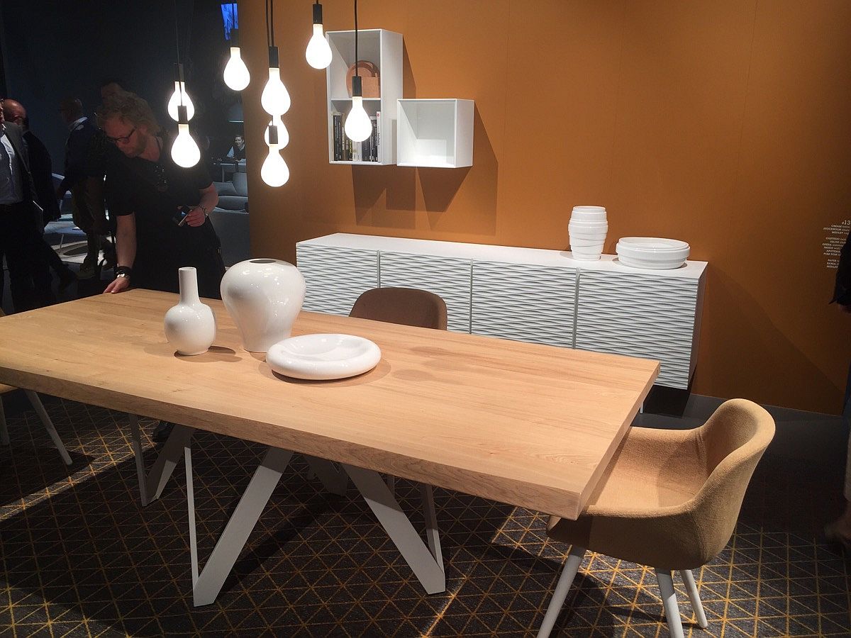 Wooden dining table chairs, lighting and sidetable in the backdrop - Calligaris at Slaone del Mobile 2016