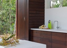 Wooden-surfaces-inside-beach-house-add-warmth-to-the-setting-217x155