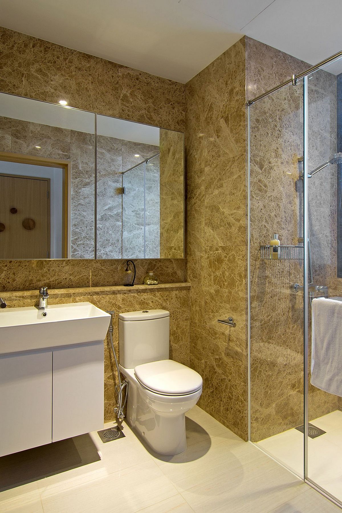 Bathroom with a cozy, inviting backdrop in yellow