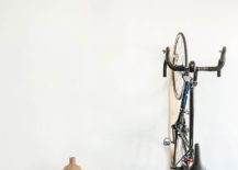 Bicycle-used-as-a-decorative-piece-inside-the-bachelor-pad-217x155