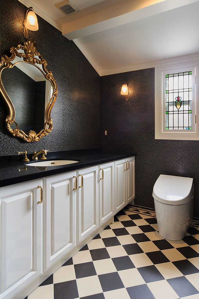 Black and gold are a great combination for a Victorian styled half bath