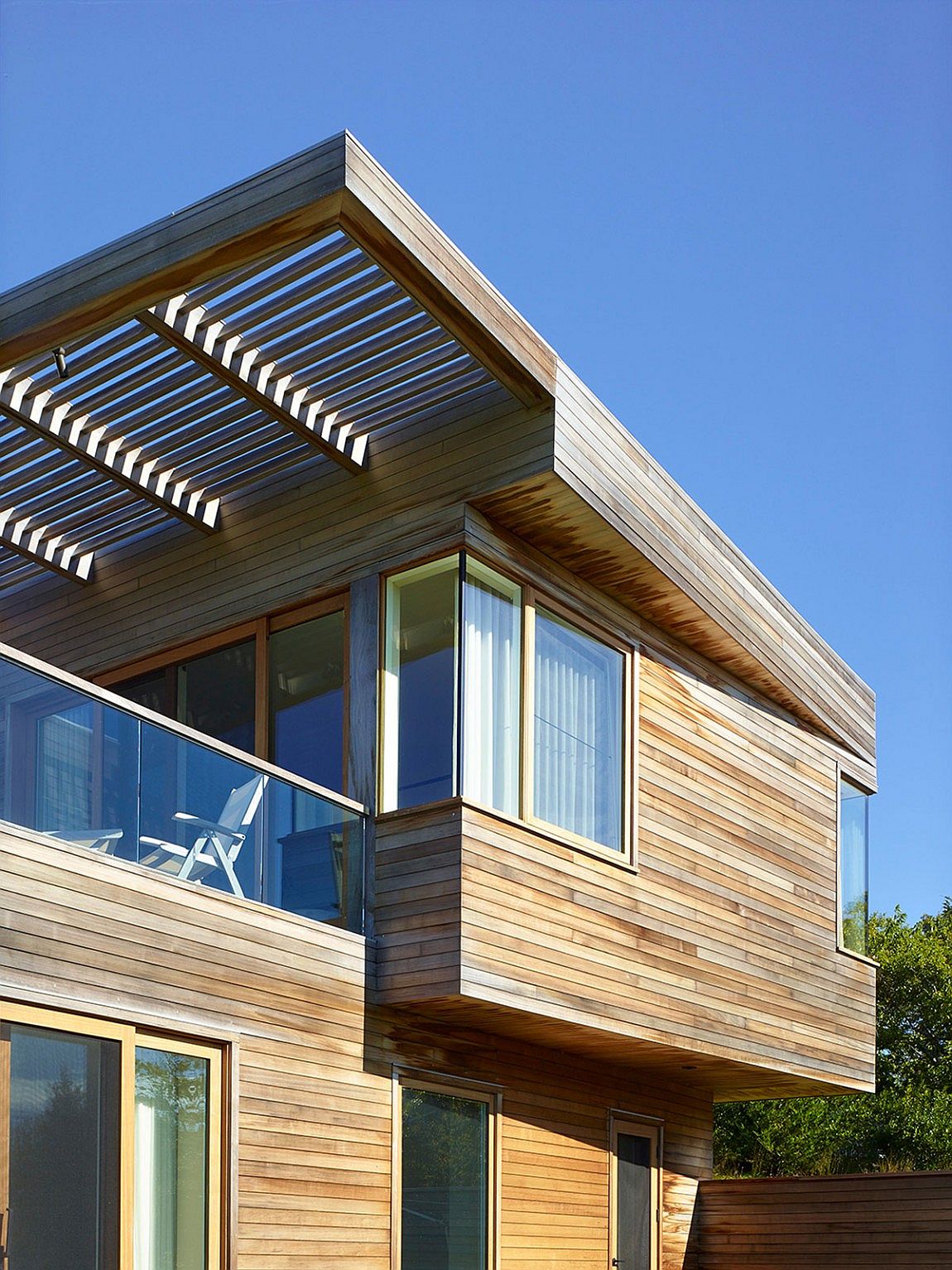 Cedar shiplap adds textural beauty to the exterior of the house