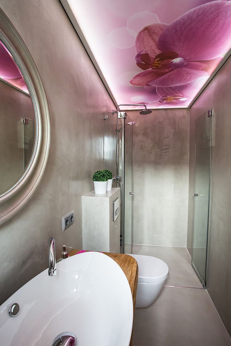 Ceiling stands out as a captivating work of art in this contemporary bathroom