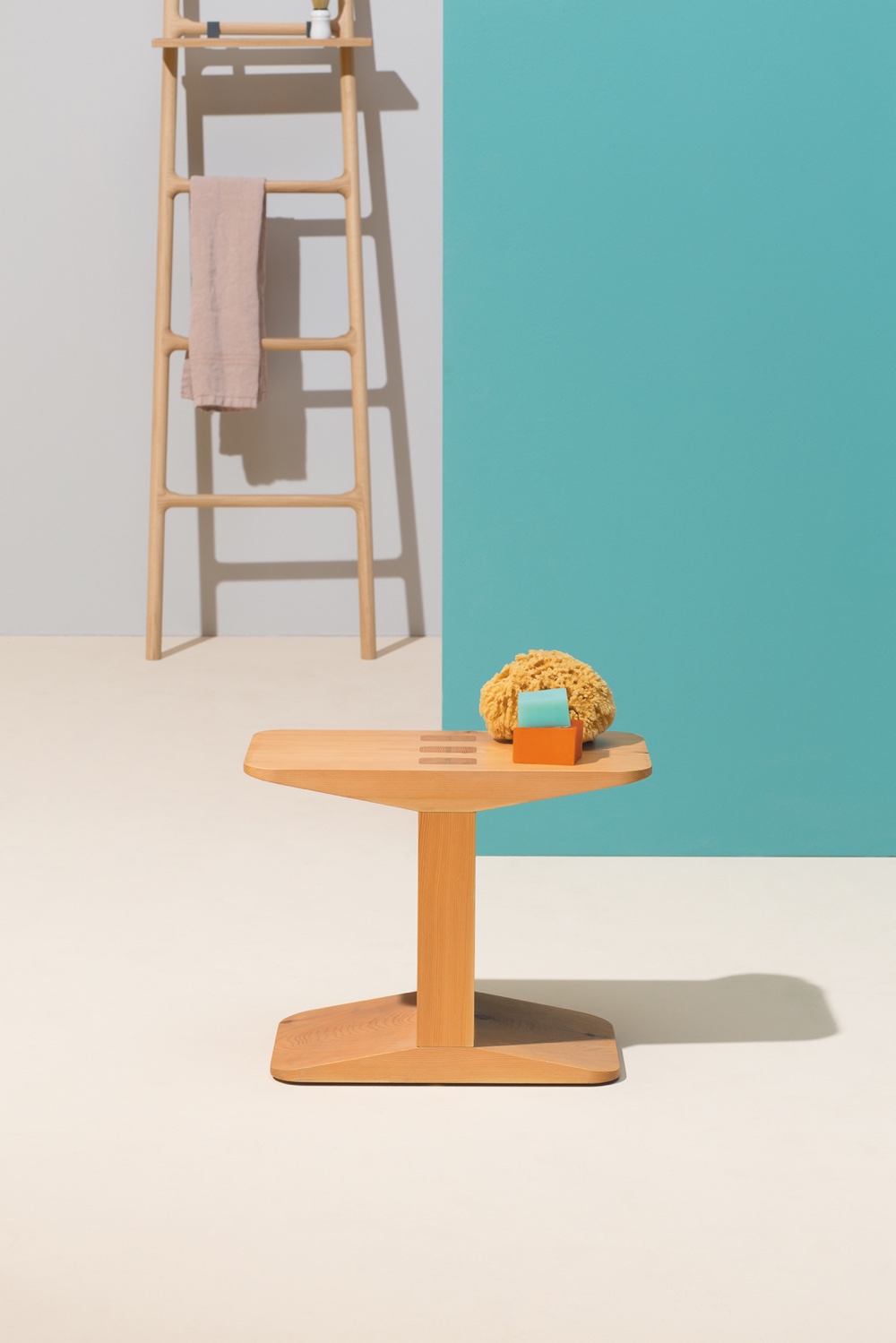 The Centanni solid larch stool designed by James Irvine. Image via Klat.