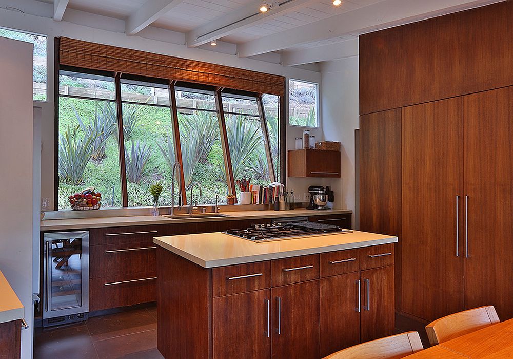 Classic kitchen with sloped window and wooden cabinets