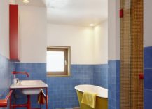 Colorful-modern-bathroom-with-standalone-bathtub-in-yellow-217x155