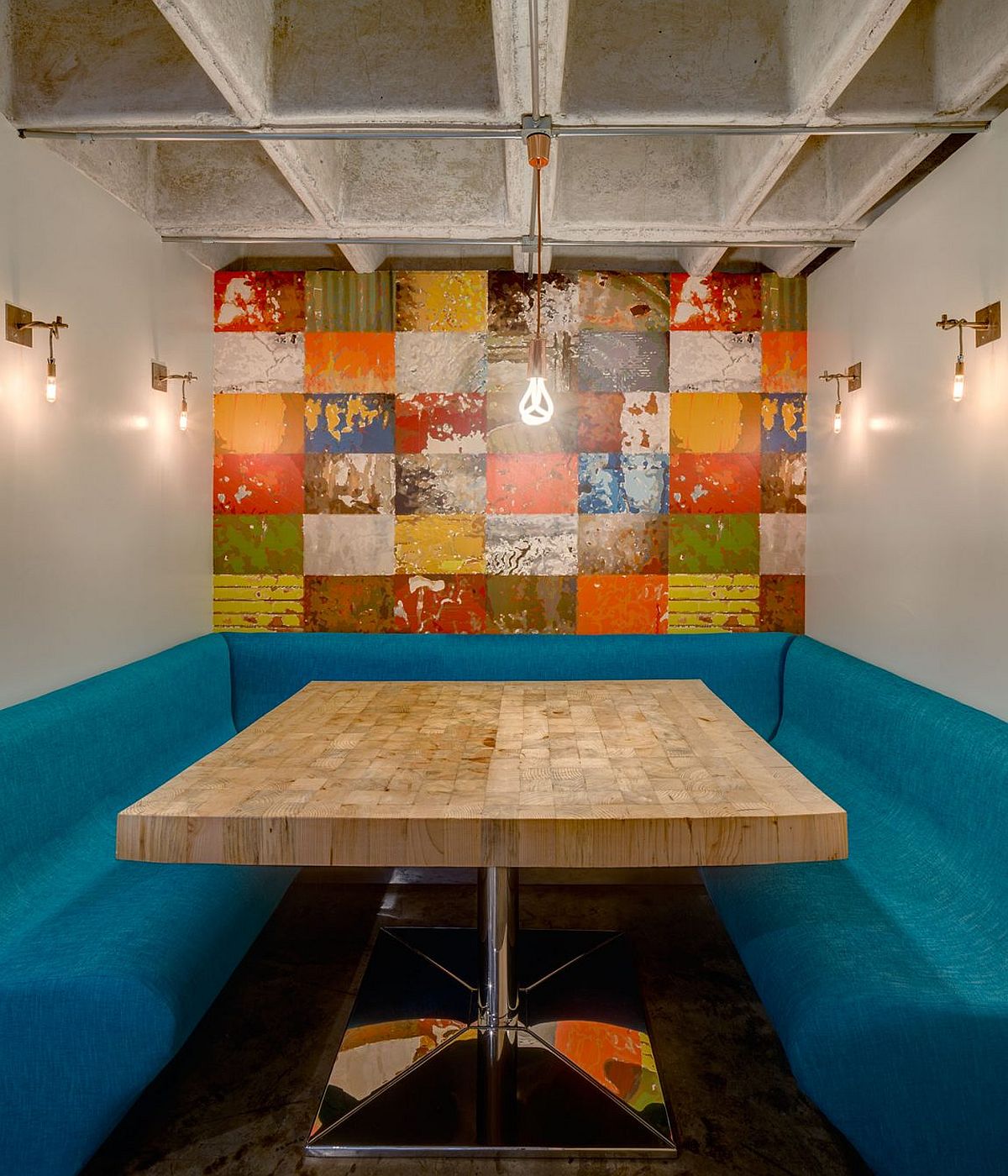 Colorful wall mural and seating for the breakfast zone