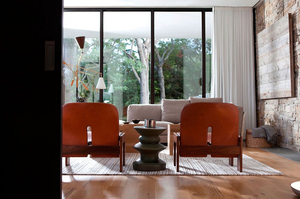 Combination of drapes and glass doors offer smart ventilation and privacy