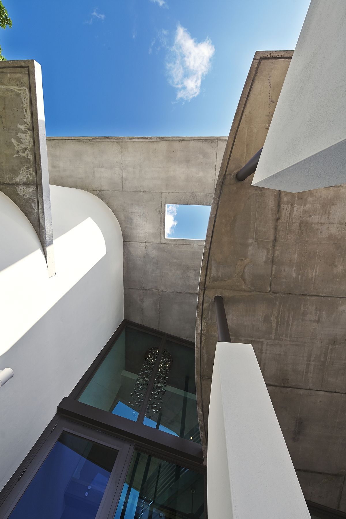 Concrete roof lines offer visual and textural contrast a the smart home