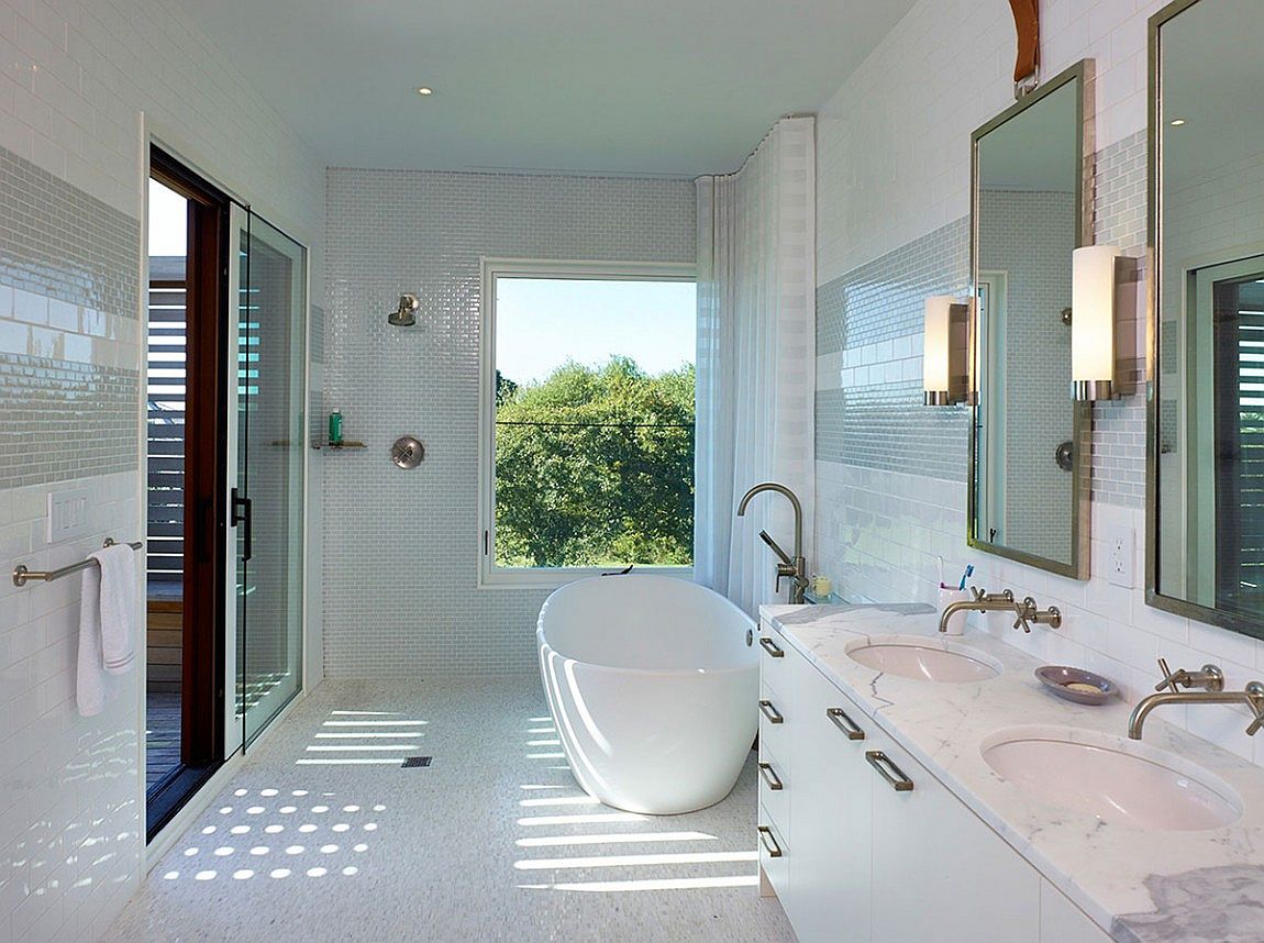 Contemporary bathroom with standalone bathtub and marble coutertop