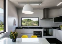 Contemporary-kitchen-in-black-and-white-with-unique-style-217x155
