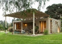 Design-of-the-pergola-structure-in-natural-materials-is-erfect-for-the-stone-house-217x155