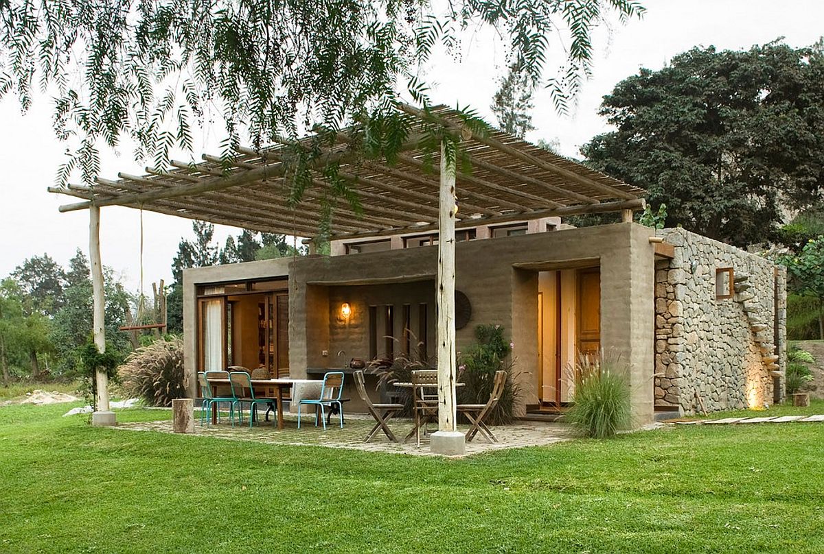 Design of the pergola structure in natural materials is erfect for the stone house