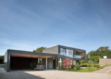 Entry-carport-and-rooftopgarden-level-at-the-expansive-private-house-in-Aarhus-217x155