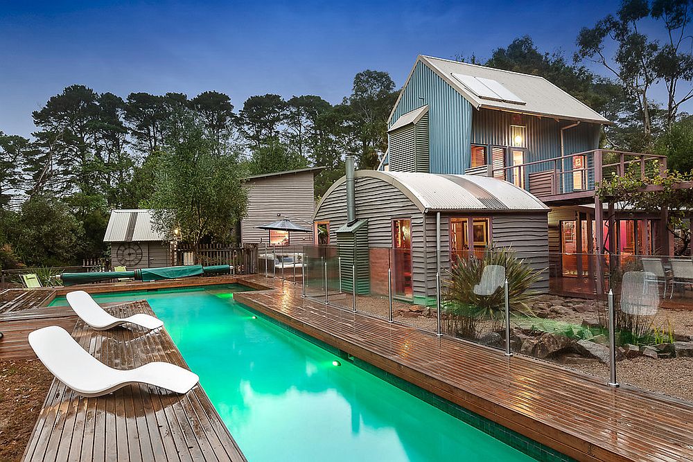 Exterior of the beach cottage-styled Bower House in mud brick, natural edge weather-boards and timber cladding