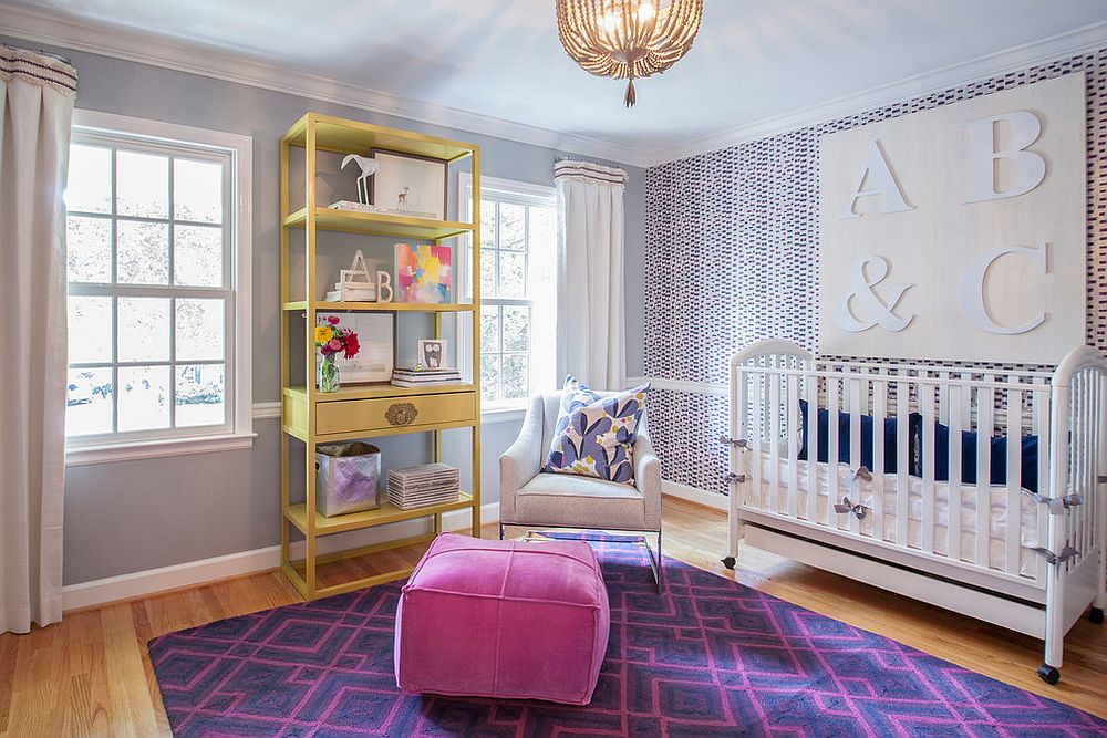 Fashionable nursery with wonderful use of wallpaper and a dash of pink