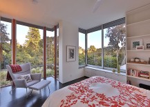 Floor-to-ceiling-glass-windows-open-up-the-bedroom-towards-the-veiw-outside-217x155