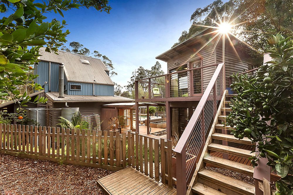 Garage, laundry and studio and main house of the Bower House in Shoreham, Victoria