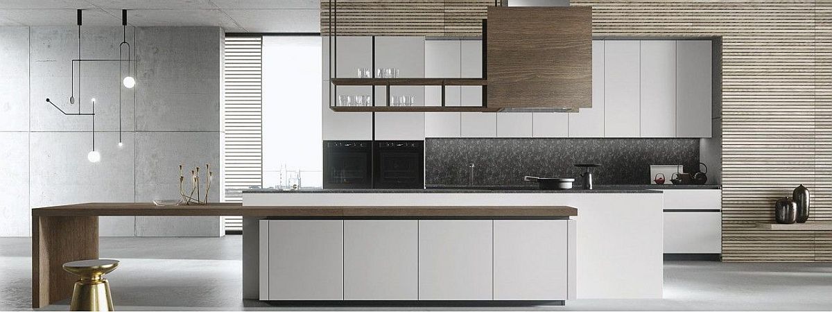 Handleless panel doors give the kitchen a minimal and sleek look