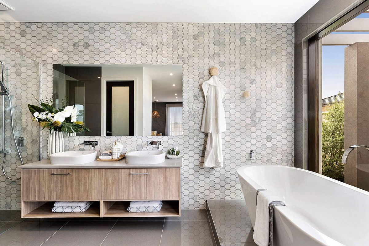 Hexagonal tiles and floating wooden vanity for the master bathroom