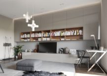 Home-office-and-media-room-turned-into-one-along-with-ample-shelf-space-for-books-217x155
