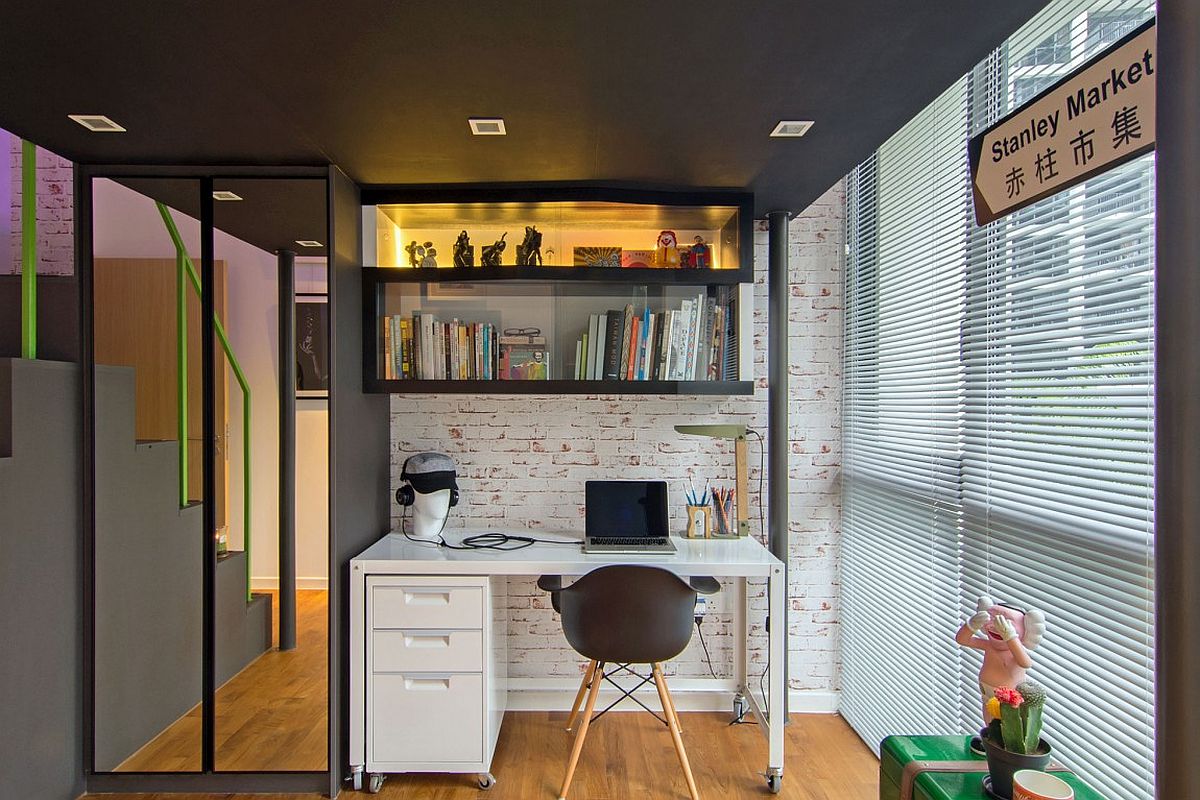 Home office with loft space above and workdesk on wheels