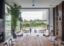Interior-of-the-home-connected-with-the-poolscape-outside-217x155