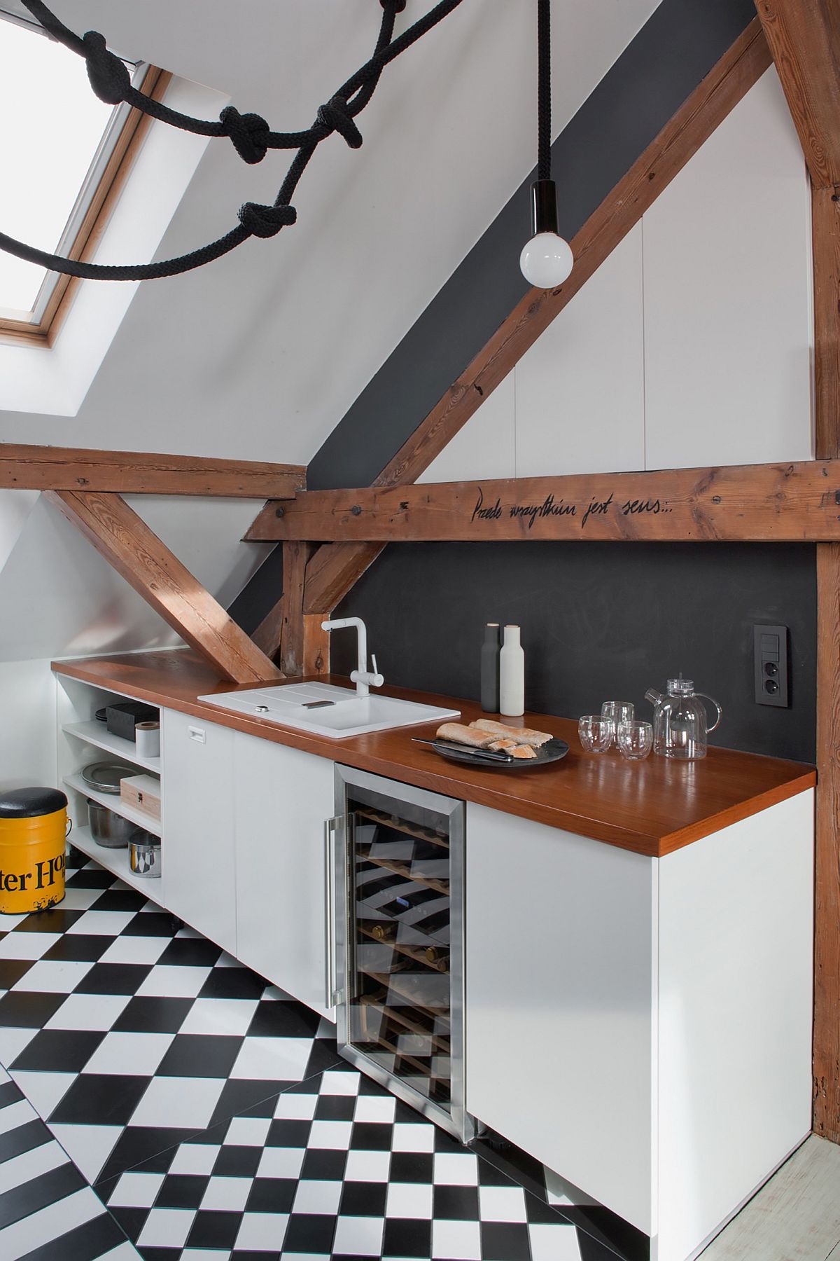 KItchen with cool black and white tiled flooring