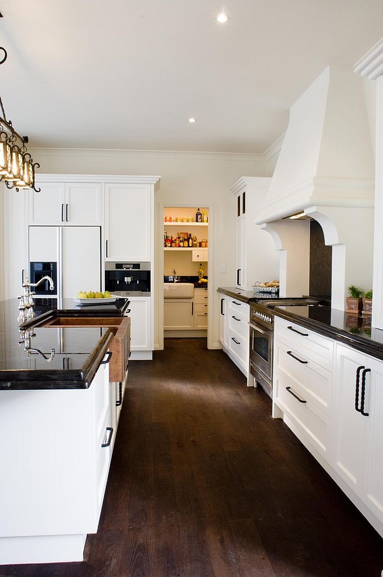 Kitchen with polished nickel faucet next to a lovely copper sink