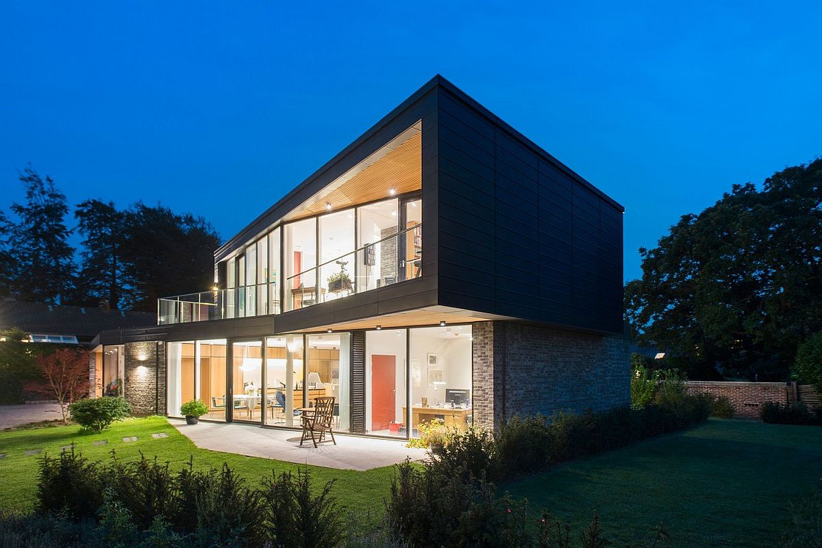 Light from the house illuminates the private garden as well