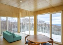 Living-room-on-the-third-floor-of-the-cabin-with-view-of-the-coastline-in-the-distance-217x155