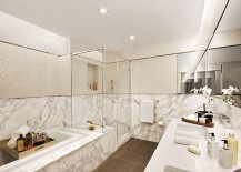 Luxurious-master-bathroom-of-opulent-NYC-apartment-clad-in-marble-217x155