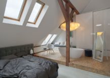 Master-bedroom-with-bathtub-that-offers-bath-under-the-clouds-experience-217x155