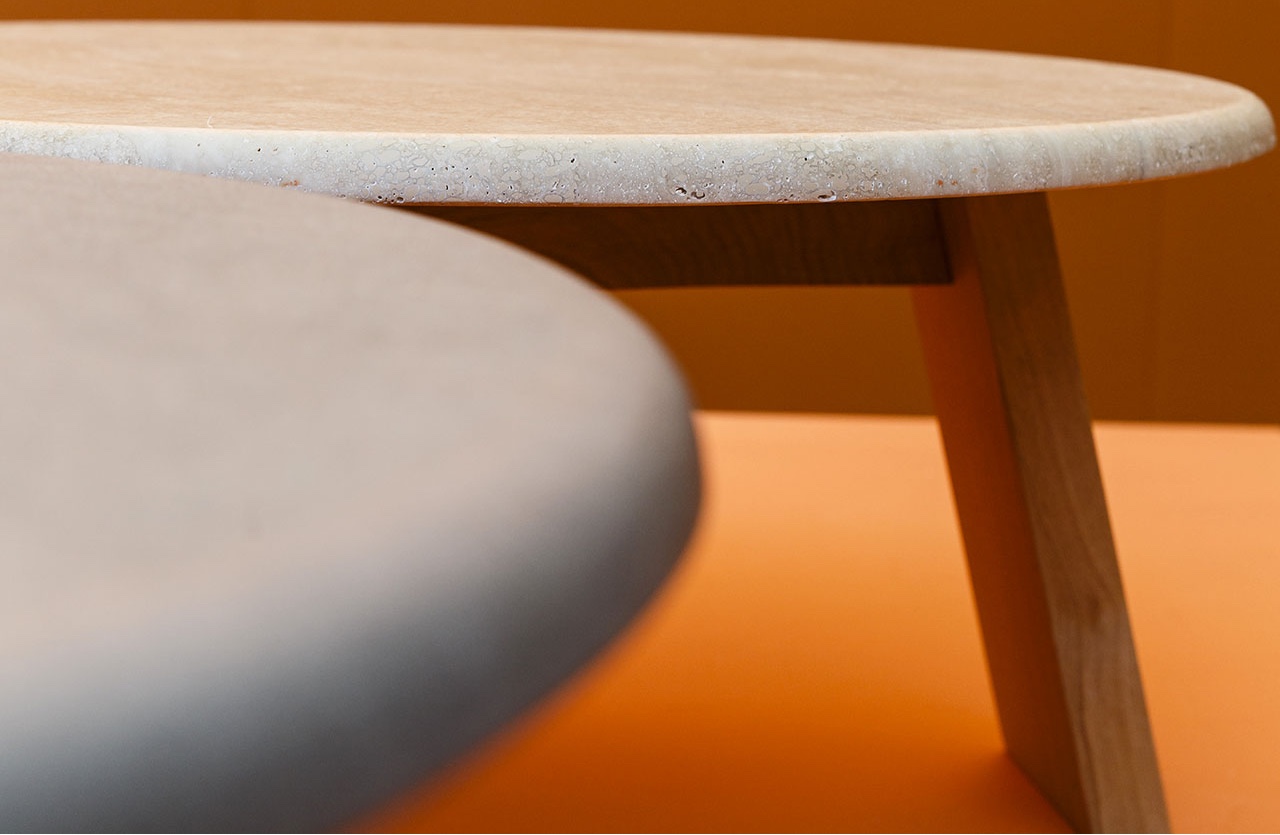 The Maya side table, designed by Lars Beller Fjetland, combines stone and wood. Image via Domus.