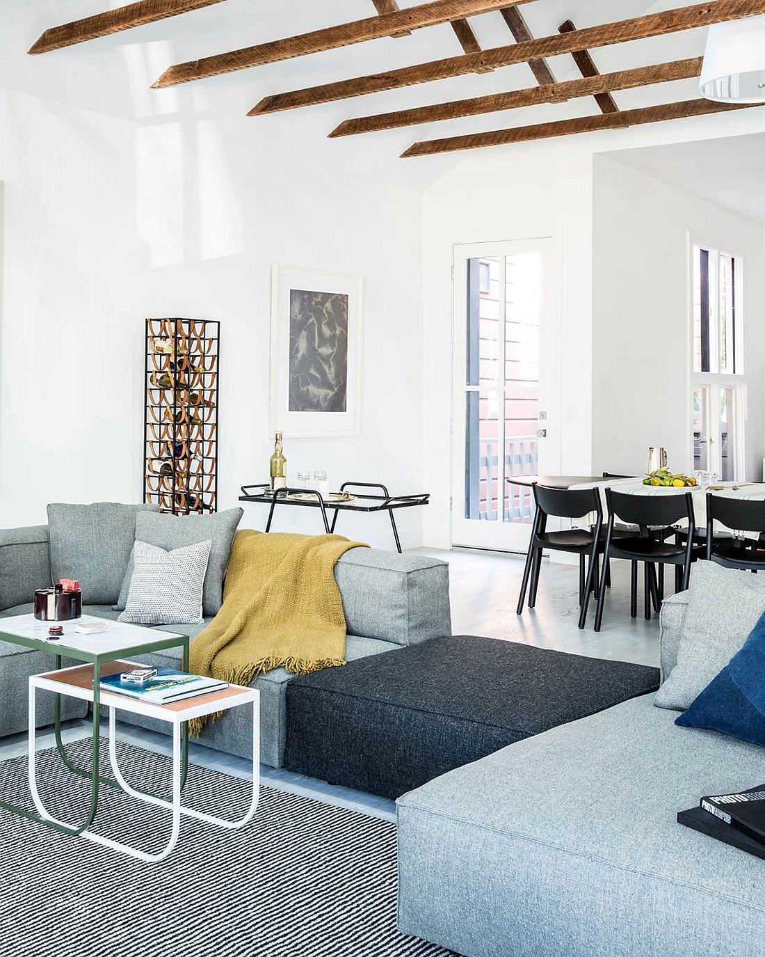 Modular couch and vintage bar cart in the living space