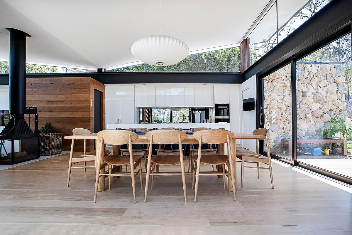 Nelson pendant adds midcentury glam to the residence in stone, glass and steel