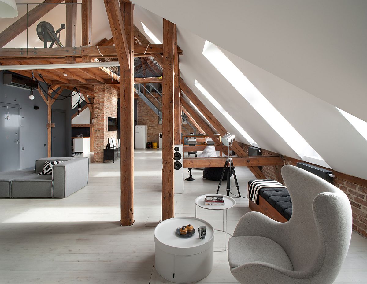 Old attic business space in Poznan turned into a spacious modern apartment